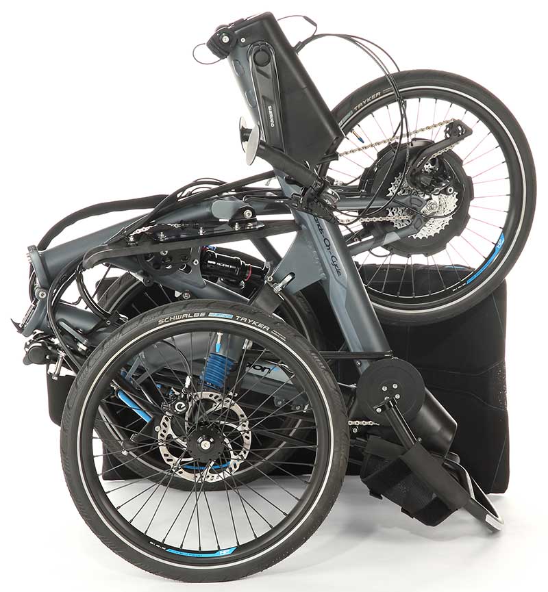 An HP Velotechnik trike with hands-on-cycle attachment folded for storage or transport