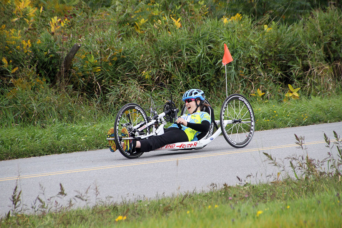 Riding a handcycle at the Kelly Brush Ride