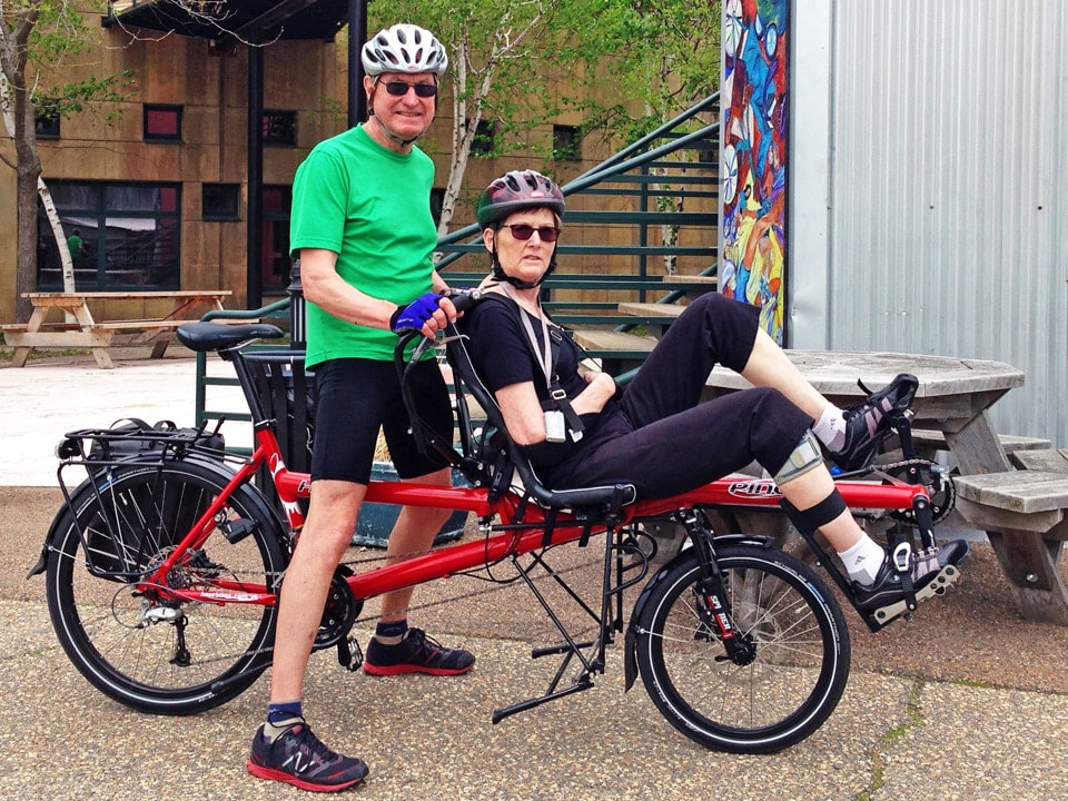 Rachel and Ted posing with their Hase Pino tandem bike 