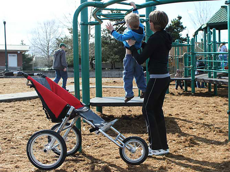 Uni-Roller Special Needs Push Chair at a playground