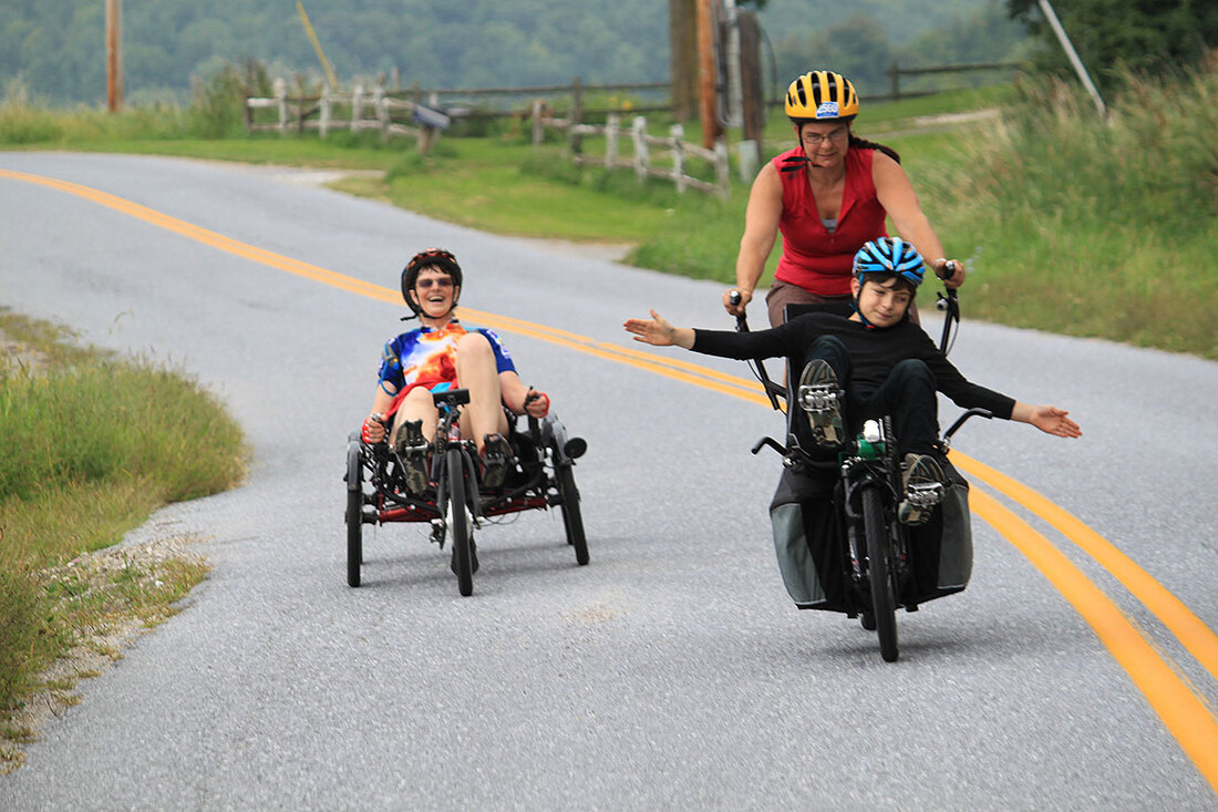 Riding recumbent and Hase Bikes Pino tandem at the Tour de Farms